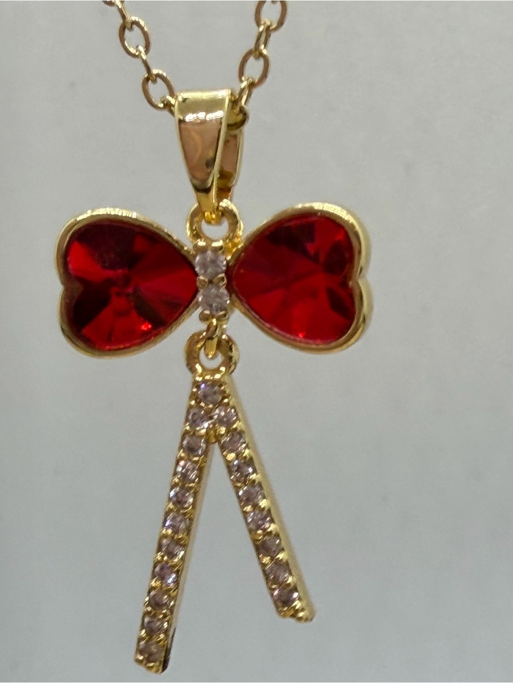 Gold-Tone Red Crystal Bow Pendant Necklace
